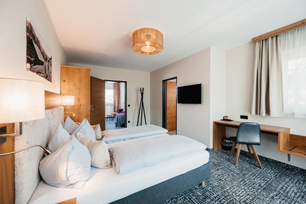 Postel nebo postele na pokoji v ubytování Hotel Schützenhof