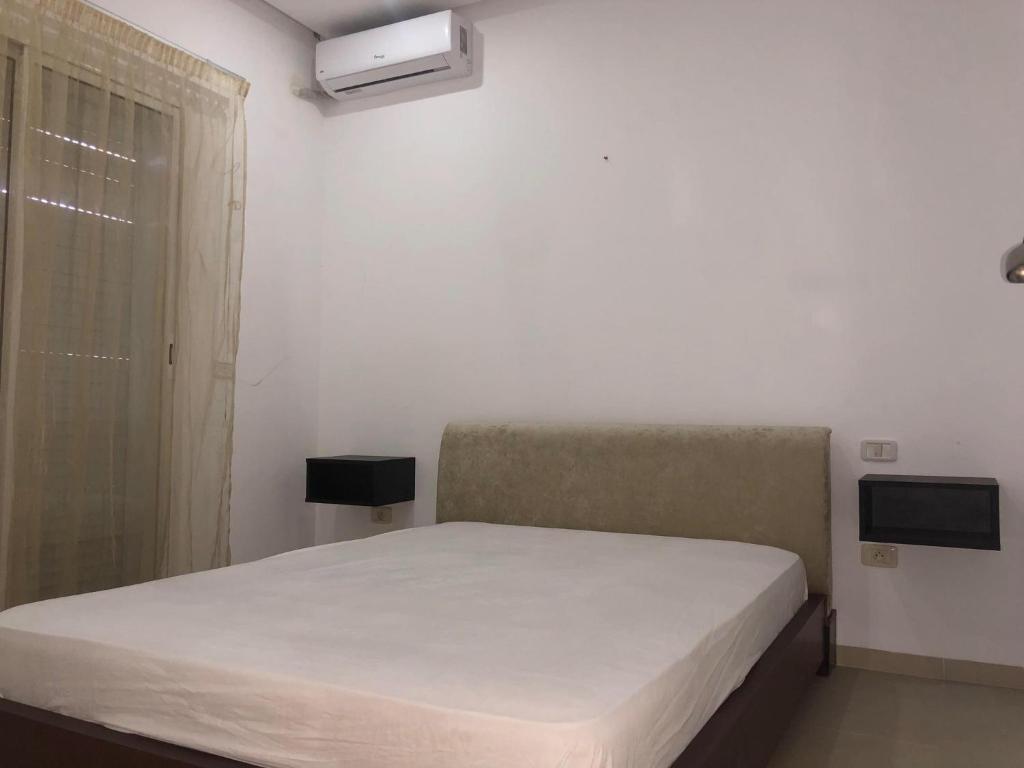 Postel nebo postele na pokoji v ubytování Résidence le corail de chat meriem