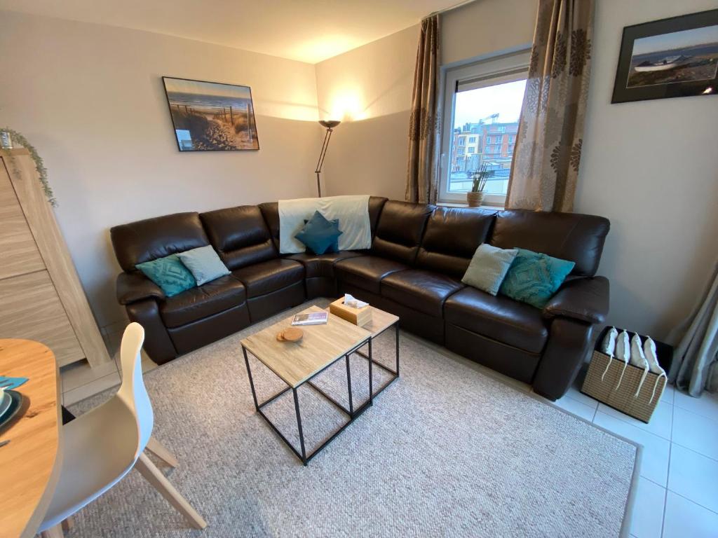 Posezení v ubytování Vakantieappartement Oostende met privéparking