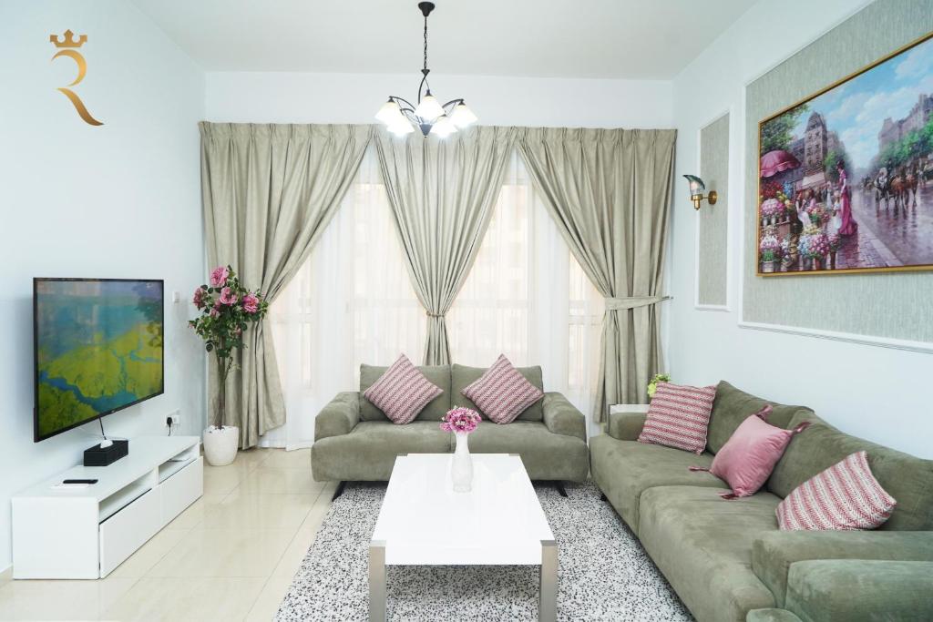 A seating area at Your Serene Getaway Haven Azure Baniyas 1BR Apartment