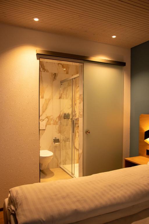 Koupelna v ubytování AMANTE Hotel
