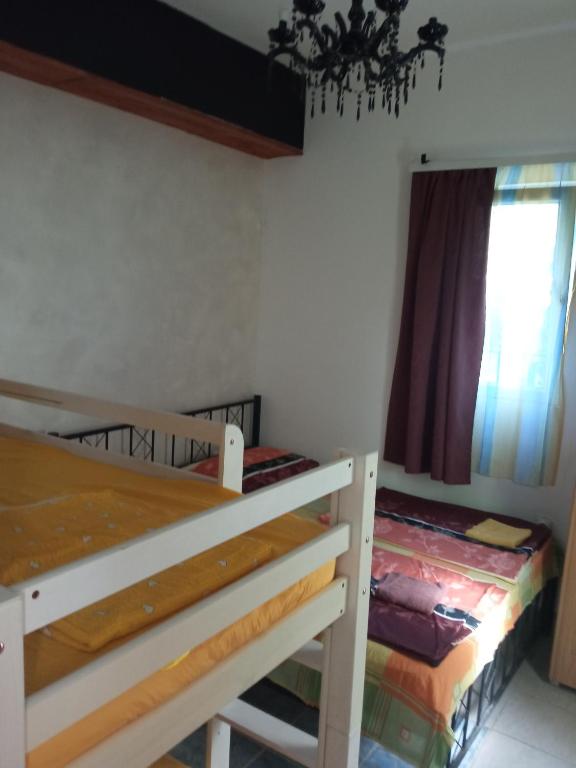 Postel nebo postele na pokoji v ubytování Casa de Laza Apartments