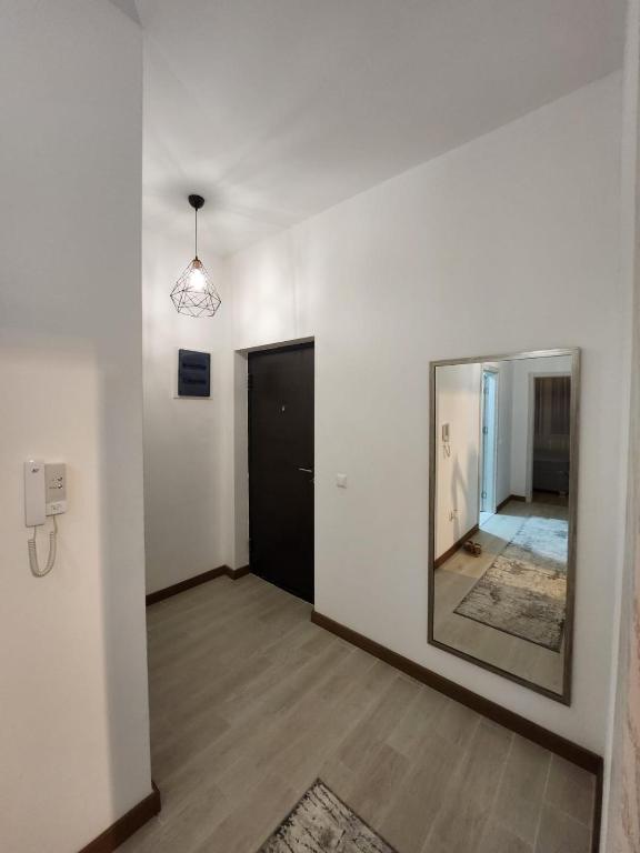 Posteľ alebo postele v izbe v ubytovaní Apartment minutes away from the beach