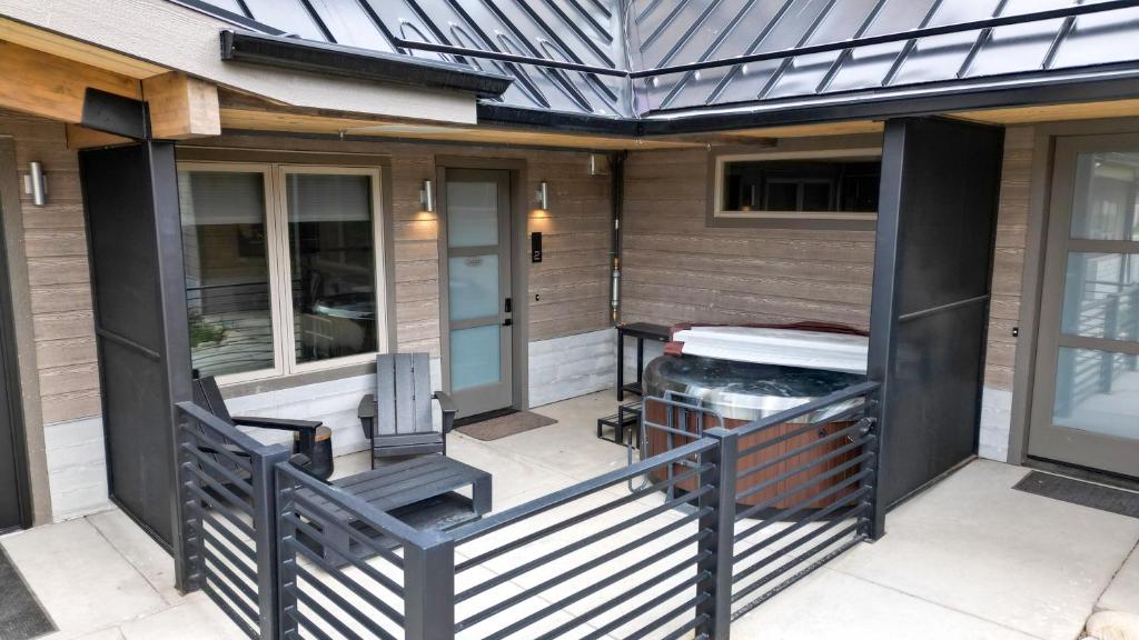 a screened porch of a house with a gazebo at Winter Park Condo w/Hot Tub & 4 Mi to Skiing in Winter Park