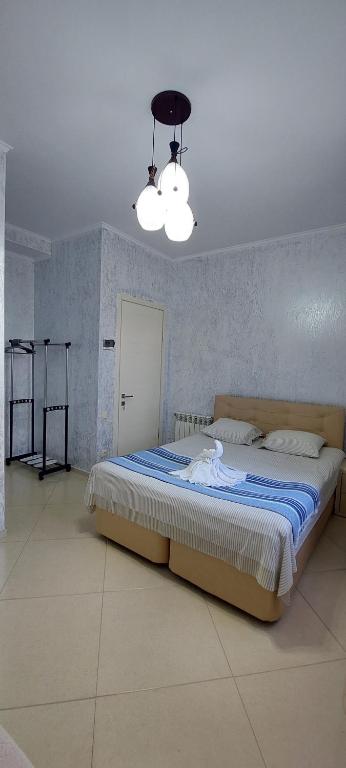 Postel nebo postele na pokoji v ubytování Hotel Ergo