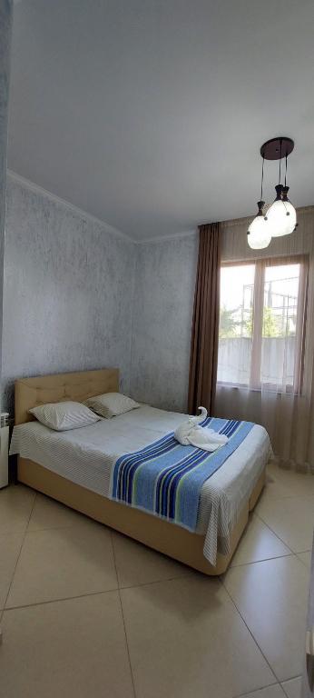 Postel nebo postele na pokoji v ubytování Hotel Ergo