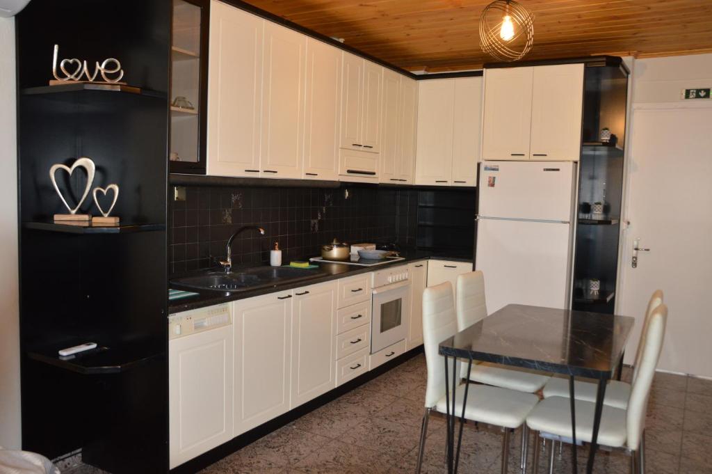 Kuchyň nebo kuchyňský kout v ubytování Elite Suites