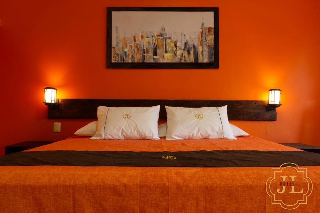 Postel nebo postele na pokoji v ubytování Hotel JL