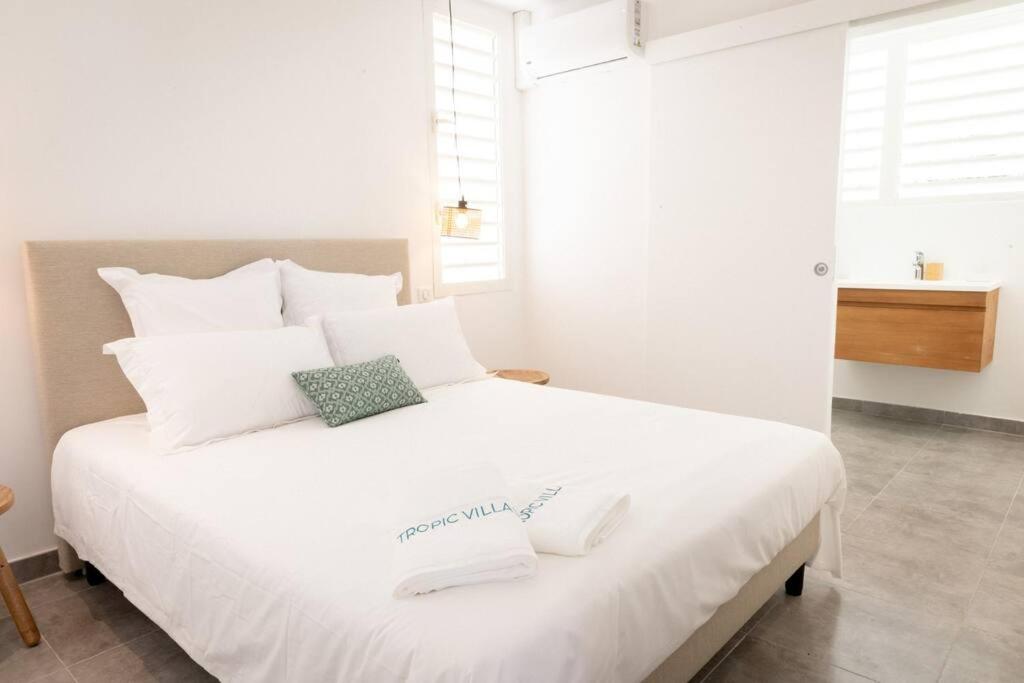 Postel nebo postele na pokoji v ubytování Ti soleil, appartement 3 pièces neuf, front de mer