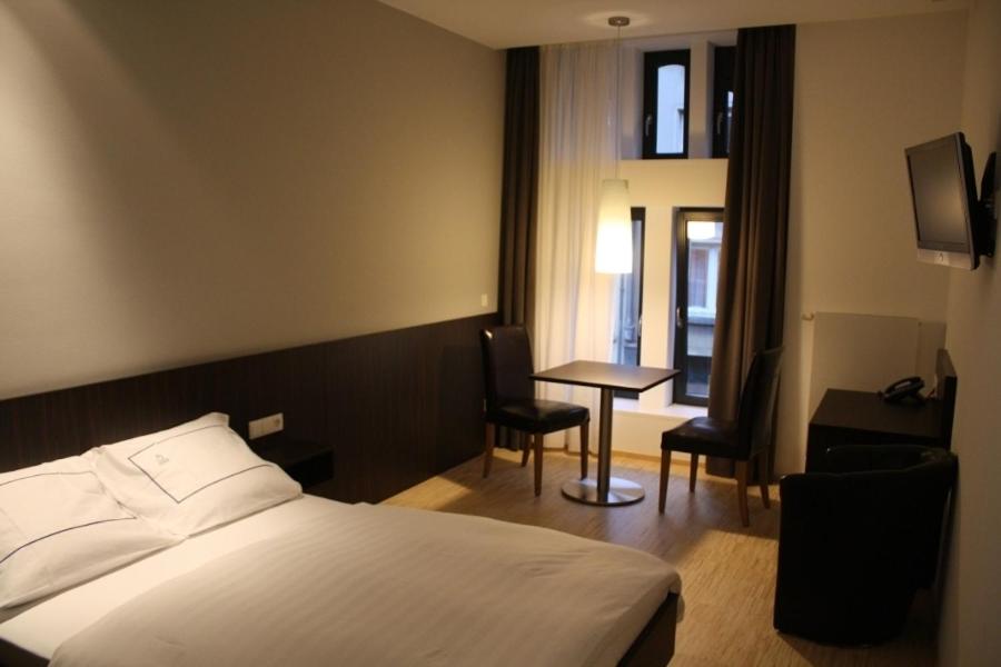 Postel nebo postele na pokoji v ubytování Apart2stay