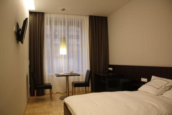 Postel nebo postele na pokoji v ubytování Apart2stay