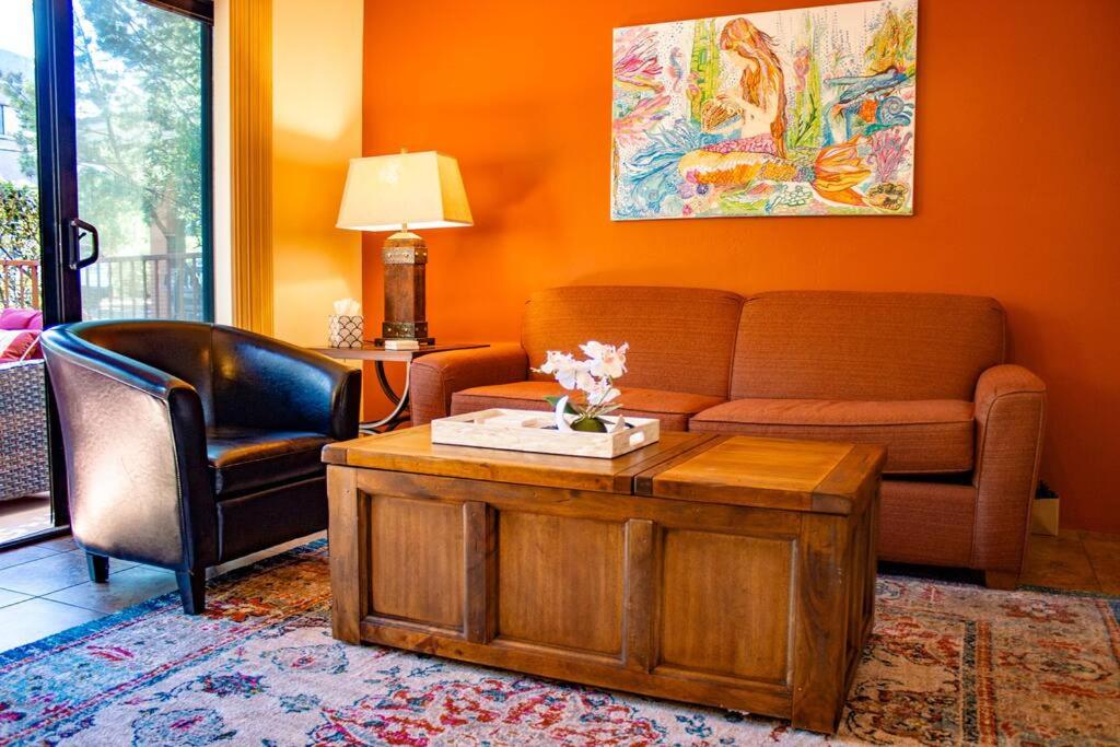 a living room with a couch and a coffee table at Desert Mermaid in Sedona in Sedona