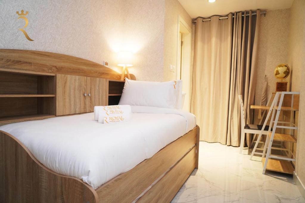 Postel nebo postele na pokoji v ubytování 2BR SkyHome at Jade Masdar City