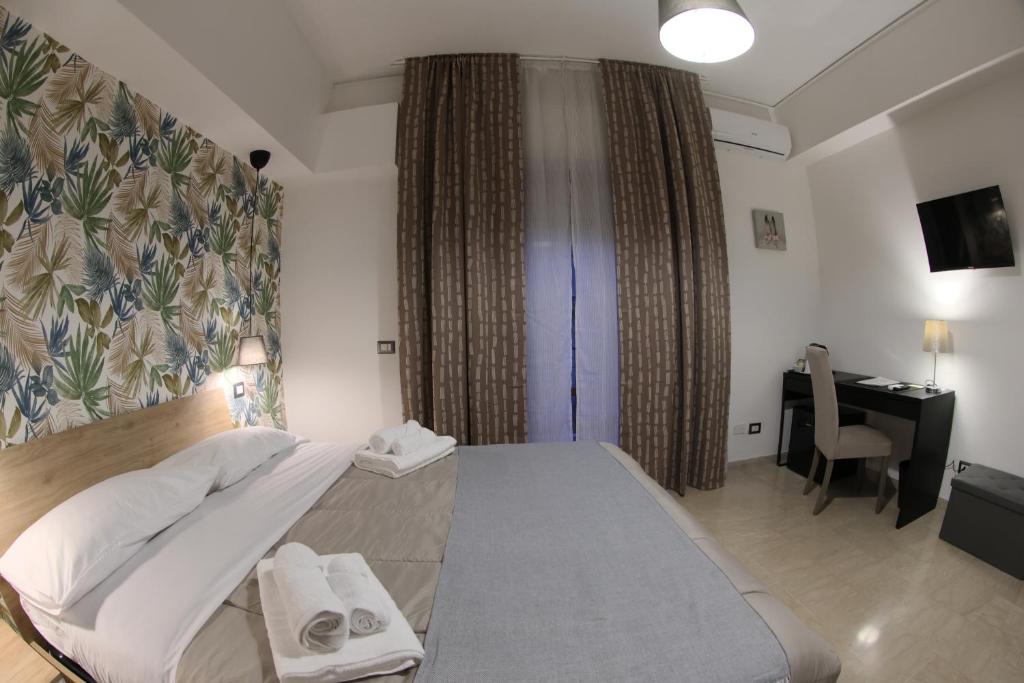 Postel nebo postele na pokoji v ubytování Dolce Vita