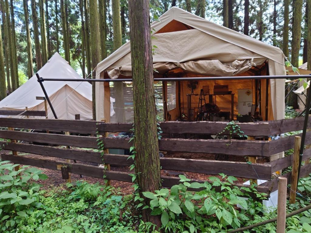 a yurt in the woods with two tents at Minamiaso STAYHAPPY - Vacation STAY 28451v in Shimoda
