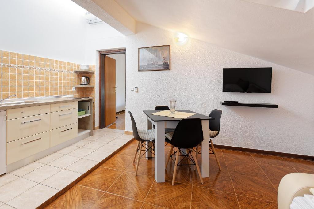 Kuchyň nebo kuchyňský kout v ubytování Apartments Exotica by Rent Istria