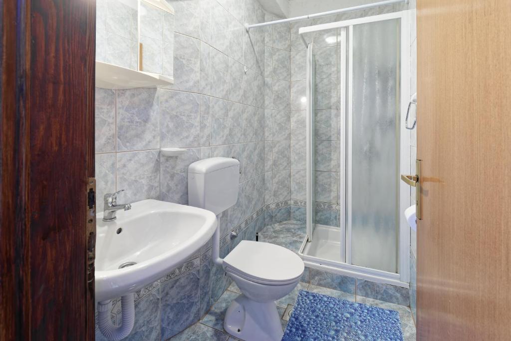 Koupelna v ubytování Apartments Exotica by Rent Istria