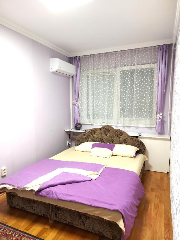 A bed or beds in a room at Rovin