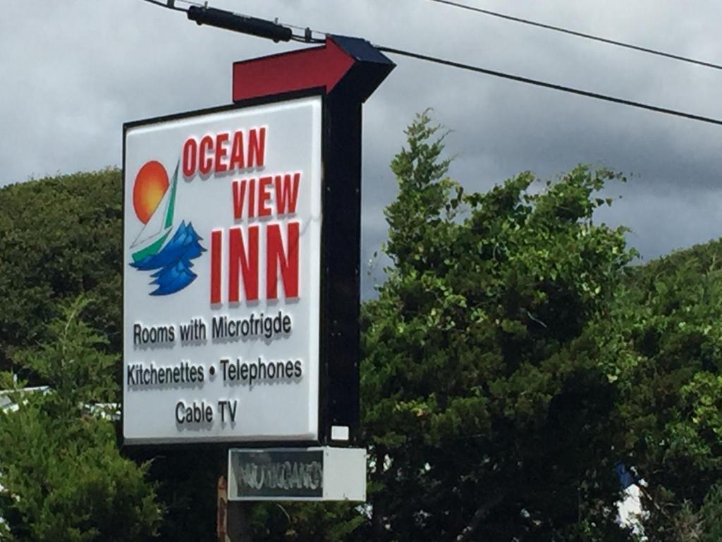 a sign for an ocean view inn on a street at Oceanview Inn - Emerald Isle in Emerald Isle