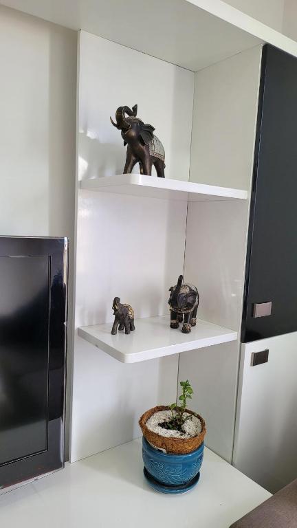 TV a/nebo společenská místnost v ubytování APARTAMENTO NUEVO AMOBLADO Neiva Conjunto Residencial Goya 504