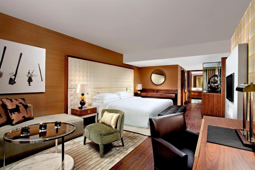 Postel nebo postele na pokoji v ubytování Sheraton Grand Hotel & Spa
