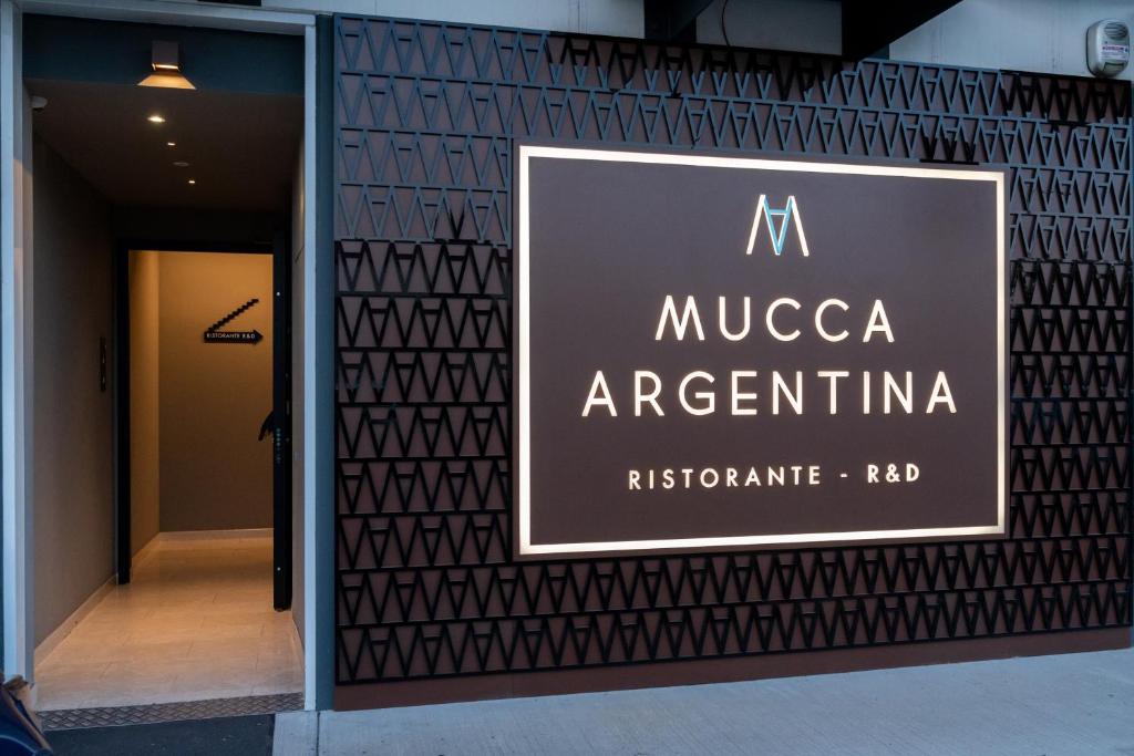 una señal para un restaurante muca argentina en R&D Mucca Argentina, en Montale