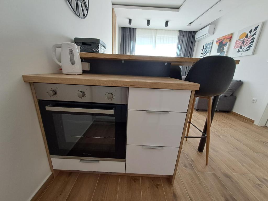 Kuchyň nebo kuchyňský kout v ubytování Apartman 64 Lux