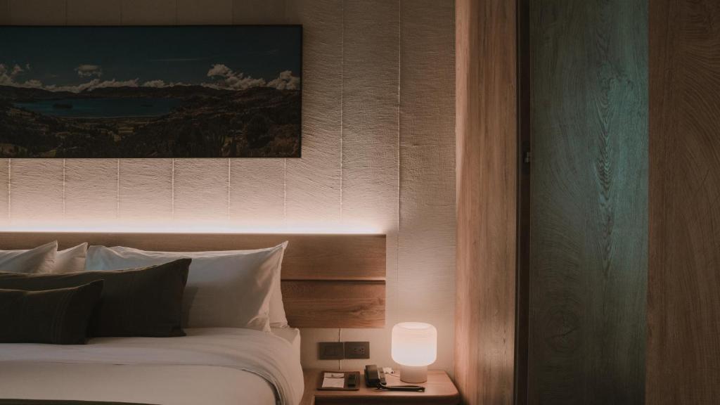 Postel nebo postele na pokoji v ubytování Hotel El Zarzo