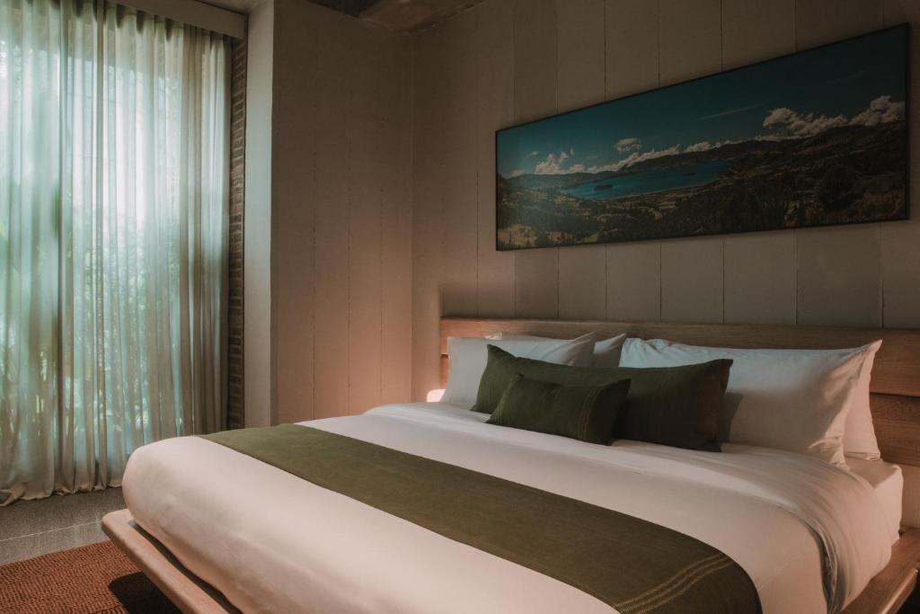 Postel nebo postele na pokoji v ubytování Hotel El Zarzo