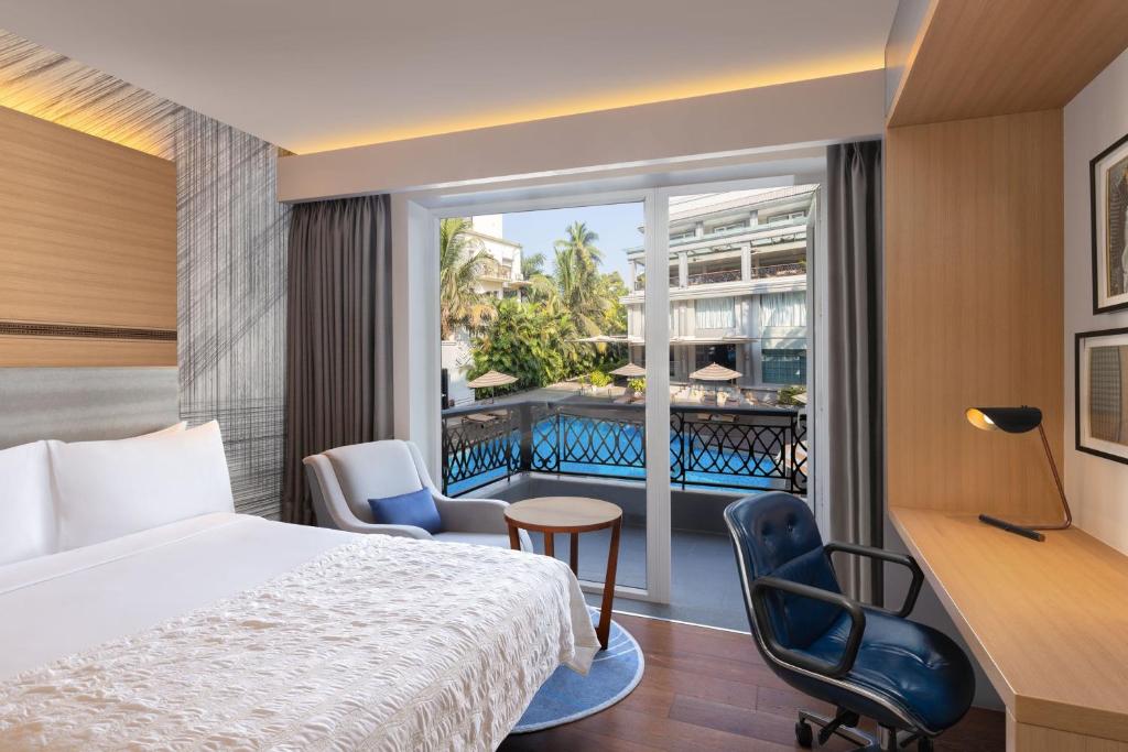 Postel nebo postele na pokoji v ubytování Le Meridien Goa, Calangute