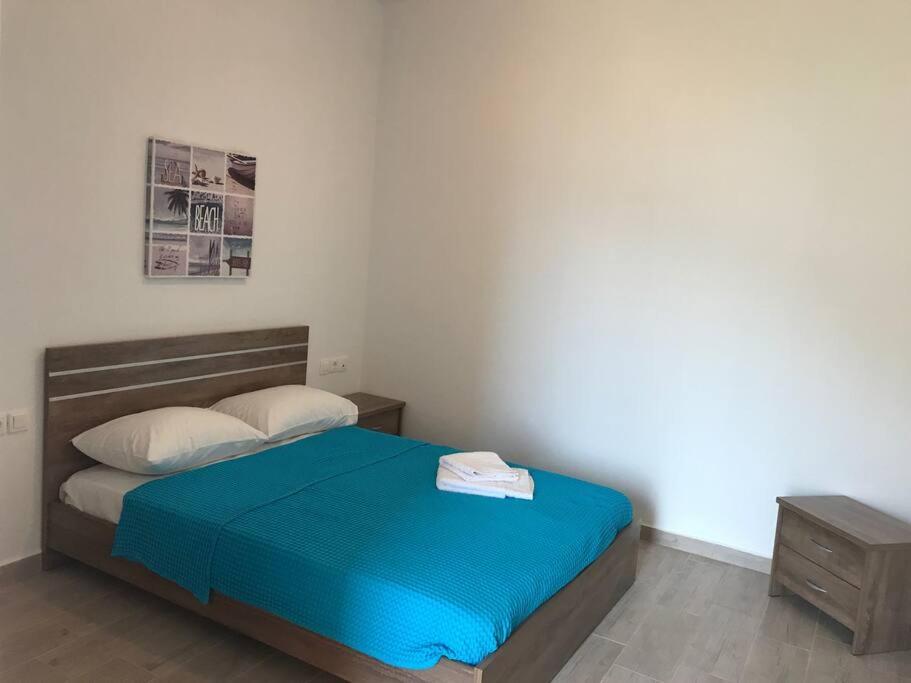 Postel nebo postele na pokoji v ubytování Karpadise Villa