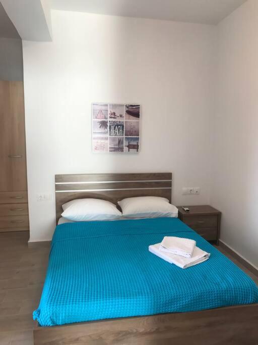 Postel nebo postele na pokoji v ubytování Karpadise Villa