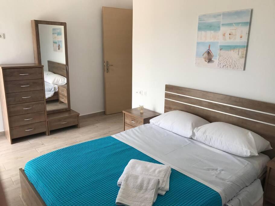 Postel nebo postele na pokoji v ubytování Karpadise Villa