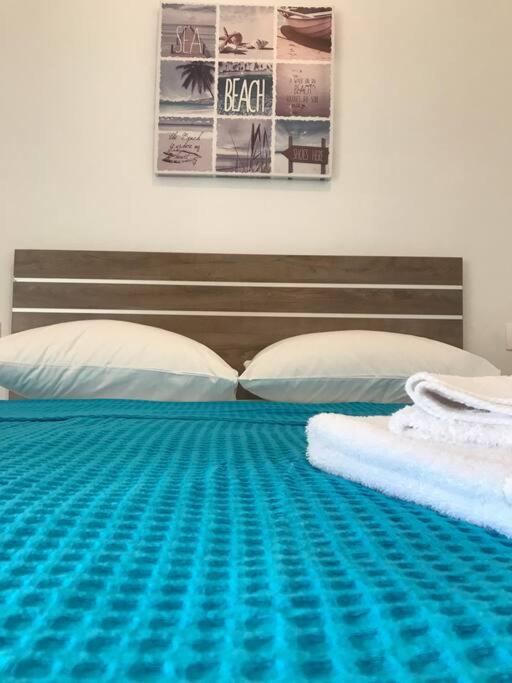 Postel nebo postele na pokoji v ubytování Karpadise Villa
