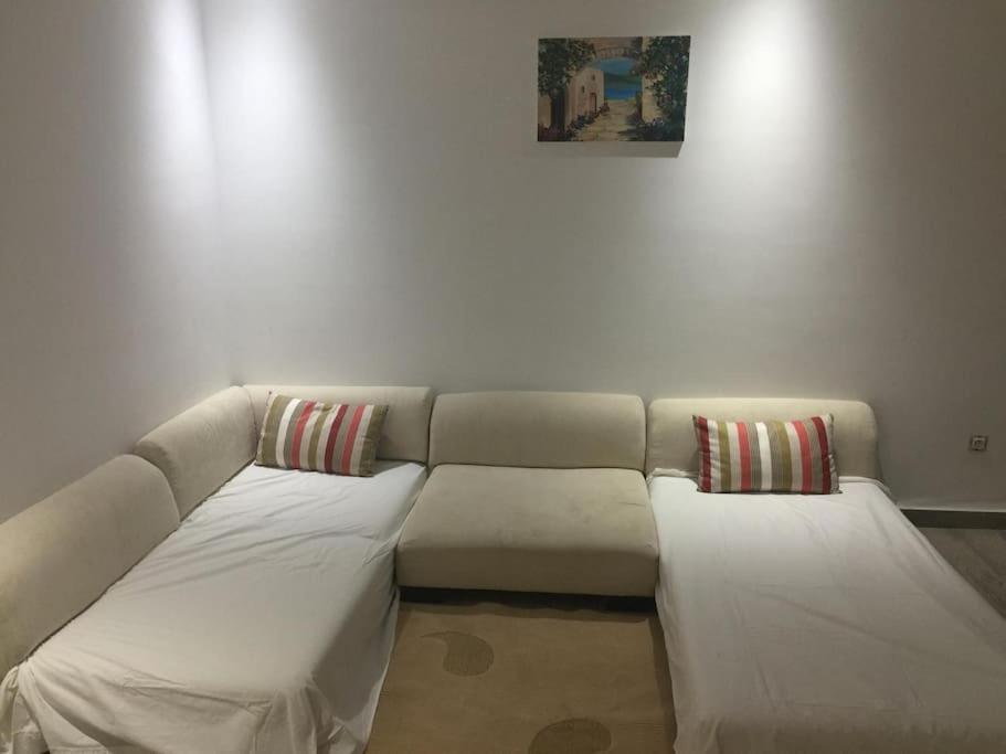 Postel nebo postele na pokoji v ubytování Résidence le corail de chat meriem
