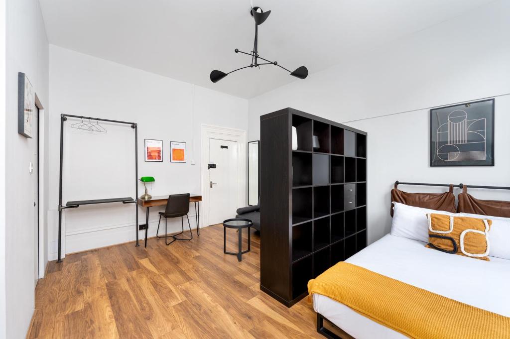 Postel nebo postele na pokoji v ubytování D8 House