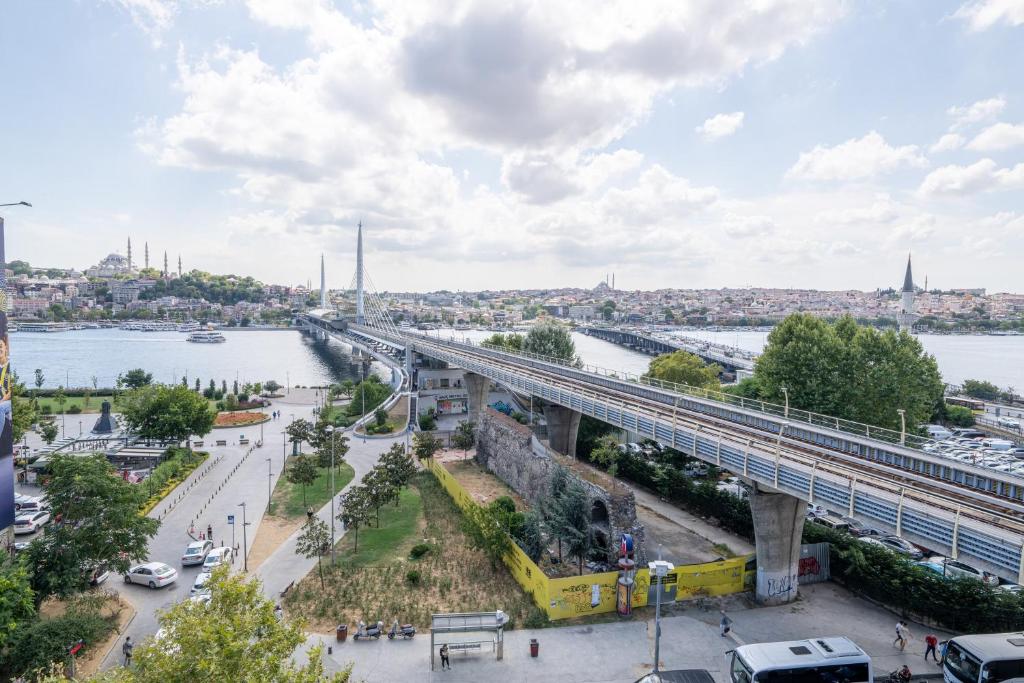 a bridge over the river in a city at Han Residence Haliç in Istanbul
