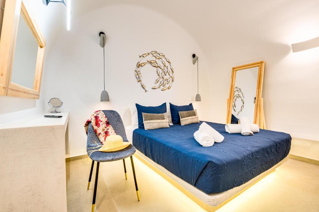 Postel nebo postele na pokoji v ubytování Tiara Suites Santorini