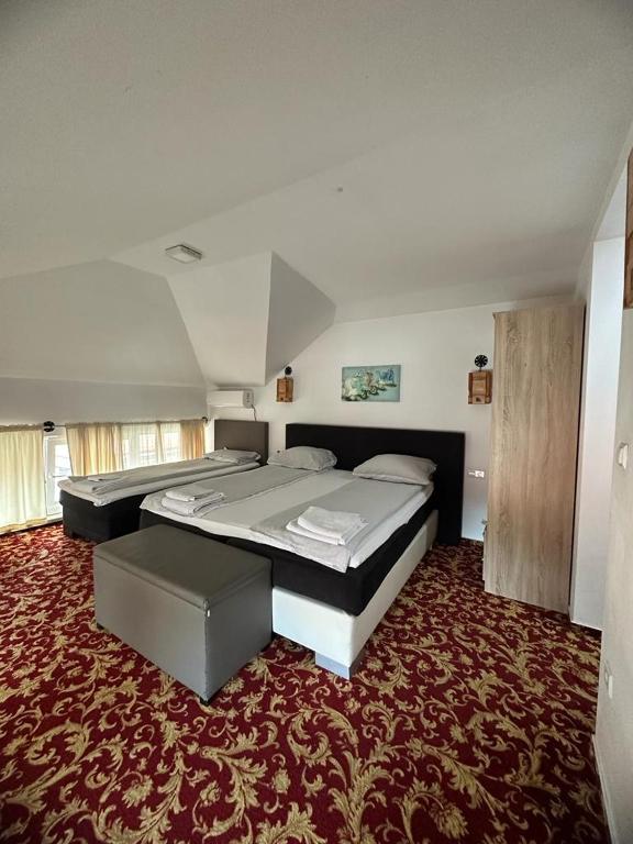 Postel nebo postele na pokoji v ubytování Residence Mahala
