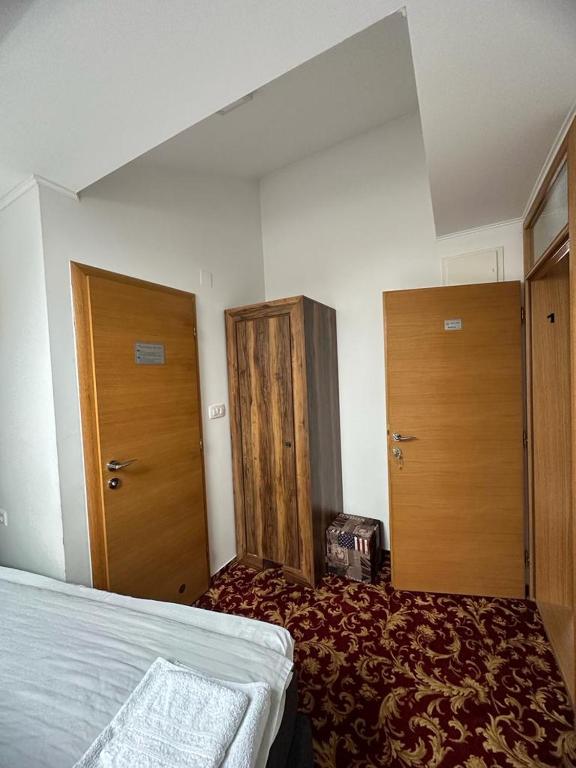 Postel nebo postele na pokoji v ubytování Residence Mahala