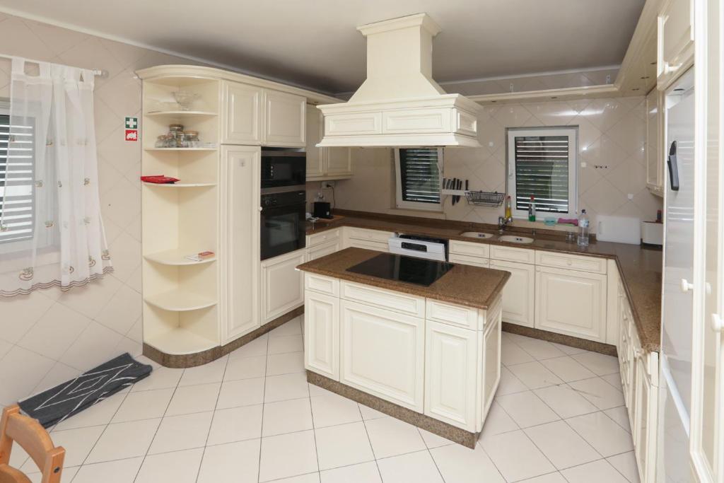 Kuchyň nebo kuchyňský kout v ubytování Yo-House