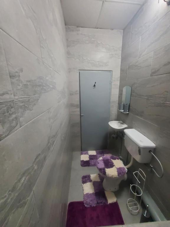 Koupelna v ubytování K&L Private Room Suites
