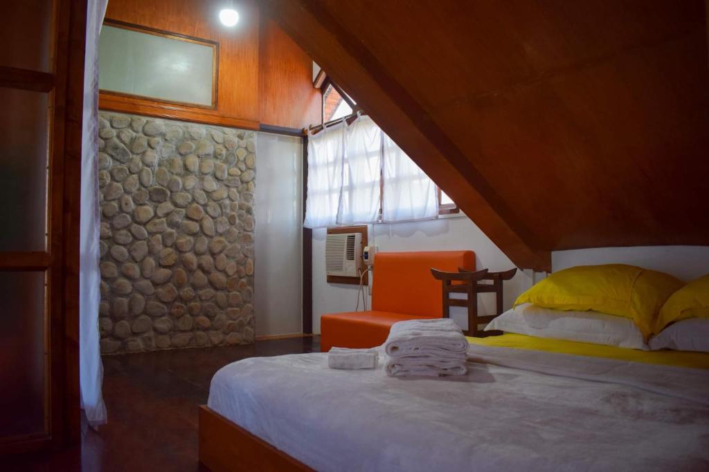 Postel nebo postele na pokoji v ubytování Orokasa Guesthouse
