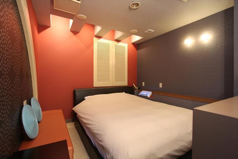Postel nebo postele na pokoji v ubytování HOTEL DCUBE