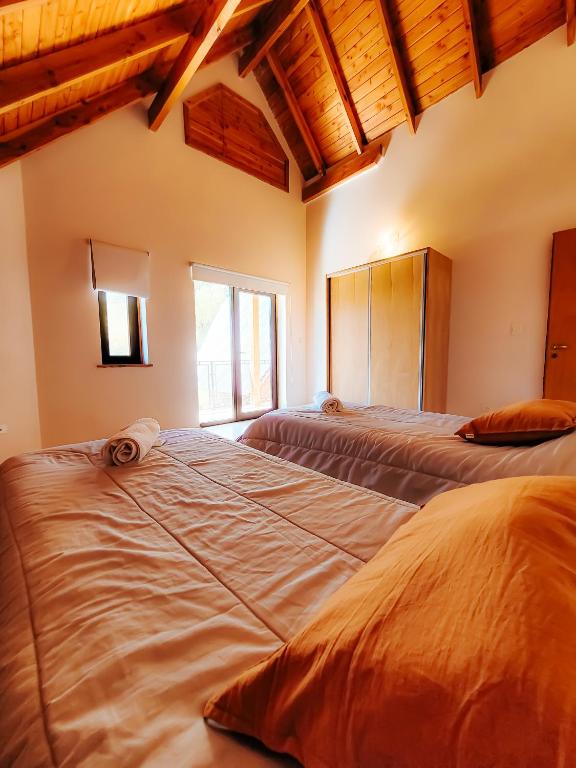 Postel nebo postele na pokoji v ubytování Cabañas espacio bandurrias