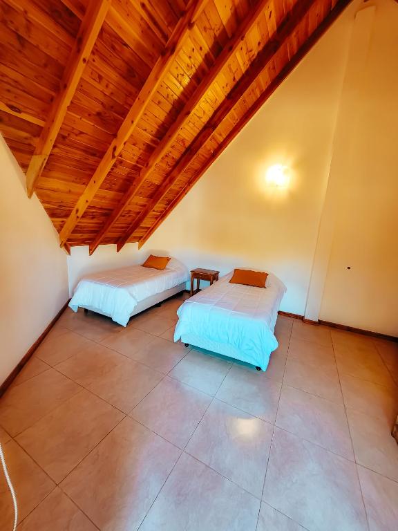 Postel nebo postele na pokoji v ubytování Cabañas espacio bandurrias