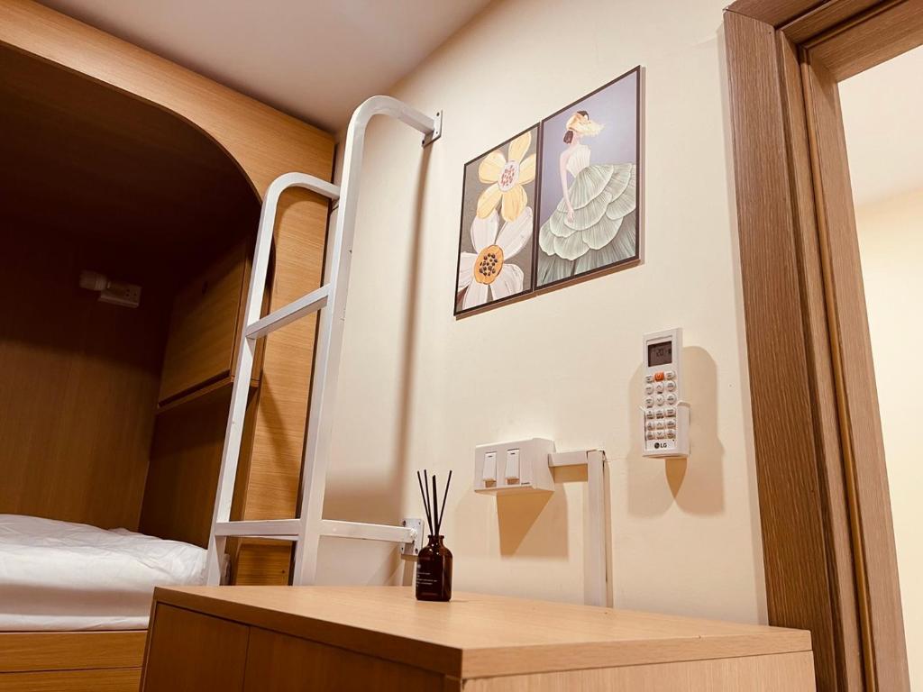 Postel nebo postele na pokoji v ubytování Basic Guest House Hải Phòng