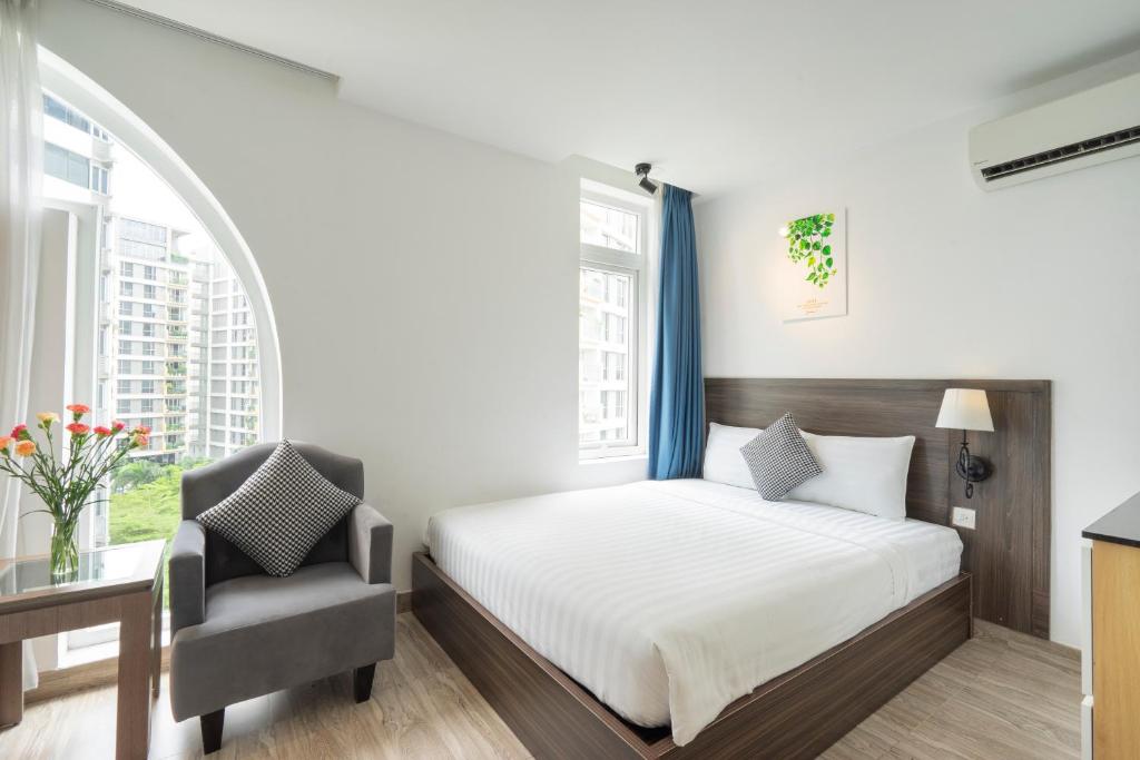 Posteľ alebo postele v izbe v ubytovaní La Airport Tan Binh Hotel