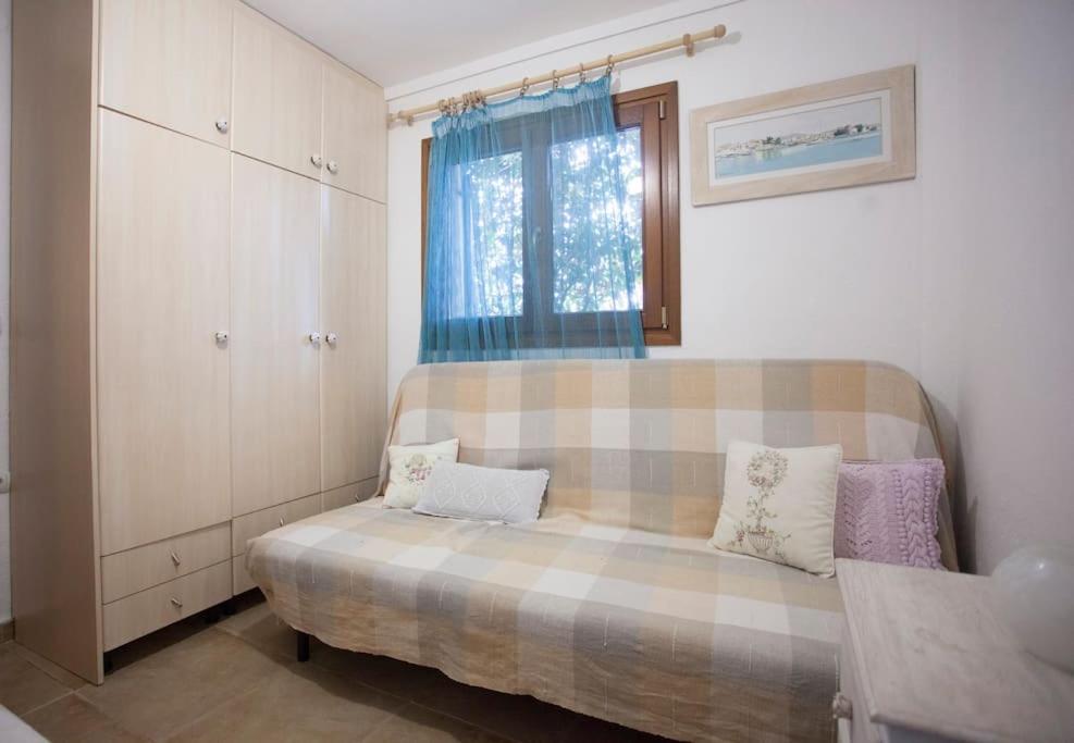 Postel nebo postele na pokoji v ubytování GAVRIADIA IERISSOS