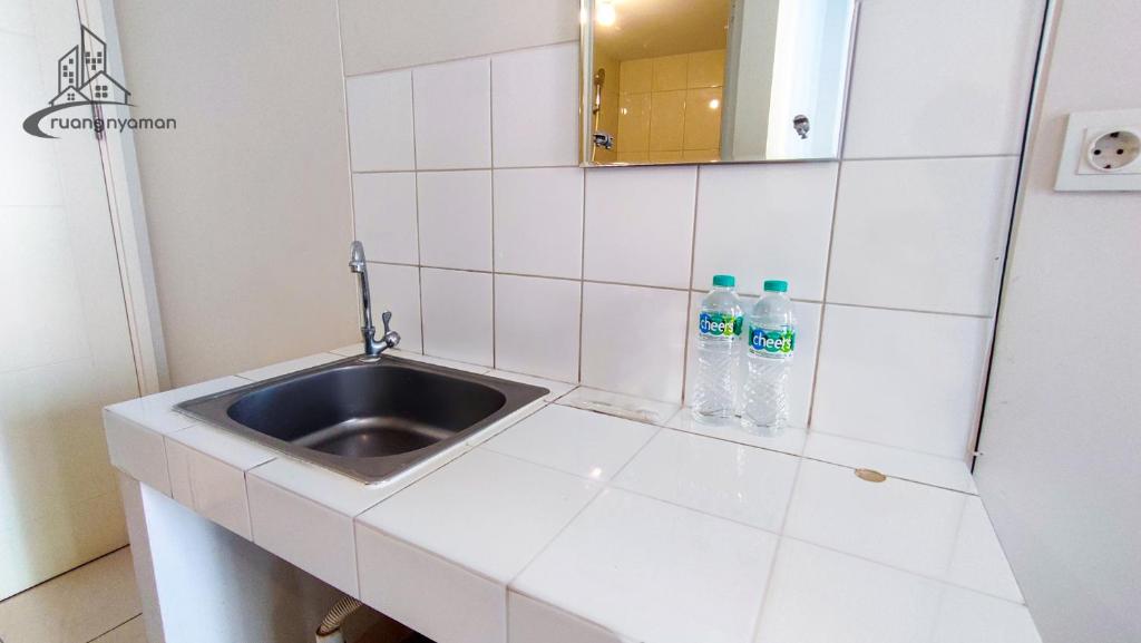 Koupelna v ubytování Springlake Summarecon Bekasi Apartement by RNA
